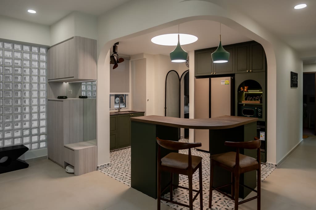 Deep green kitchen with island and patterned floor tiles at Springdale by MET Interior, a full kitchen renovation cost scope in Singapore